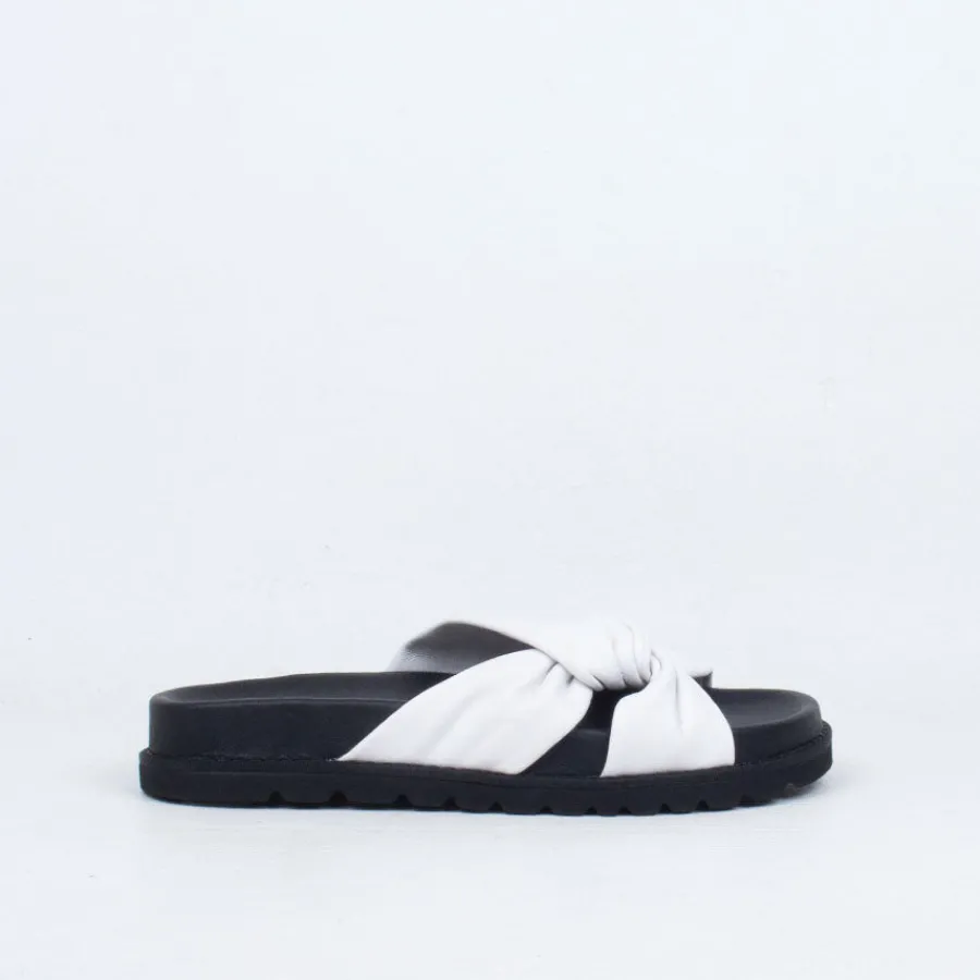 ombra_slide_20.webp Flat^Ernest Wyler Ombra Slide