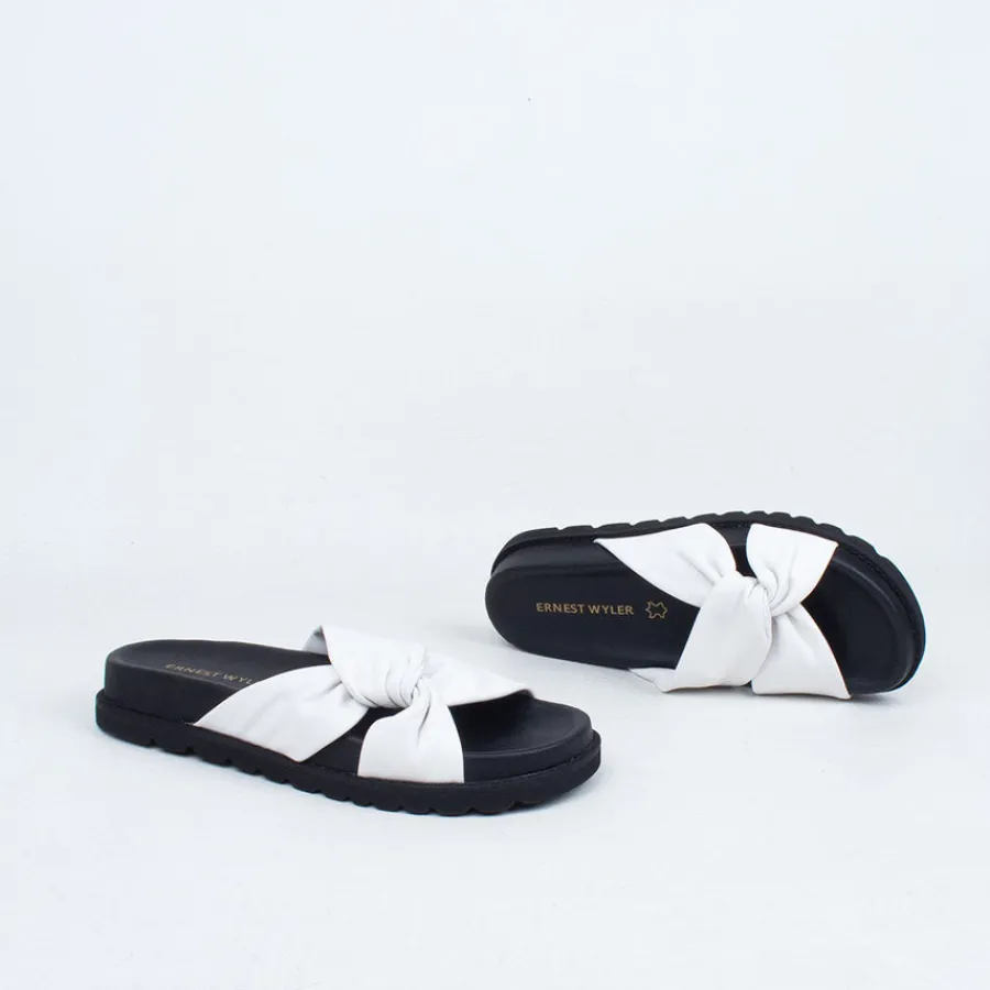 ombra_slide_21.webp Flat^Ernest Wyler Ombra Slide