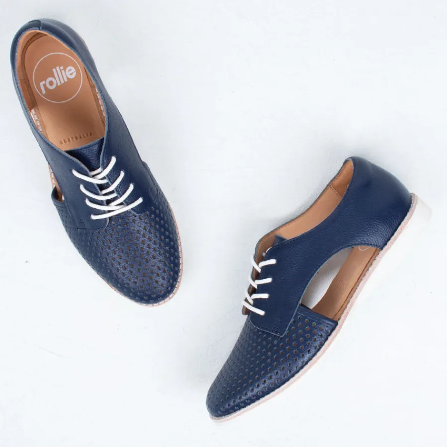 sidecut_punch_17.webp Lace Up^Rollie Sidecut Punch