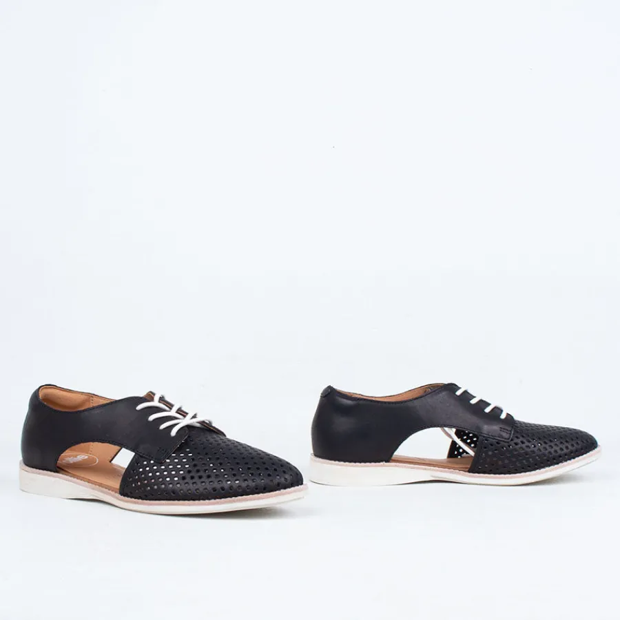 sidecut_punch_2.webp Lace Up^Rollie Sidecut Punch