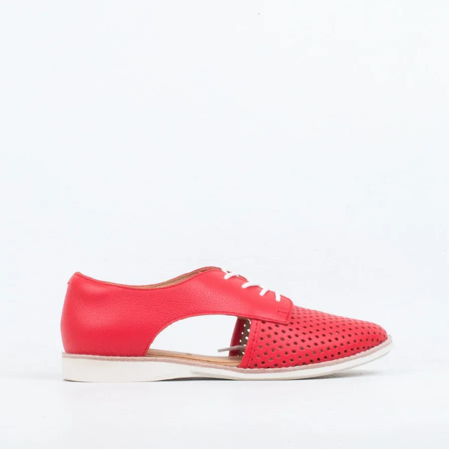 sidecut_punch_27.webp Lace Up^Rollie Sidecut Punch