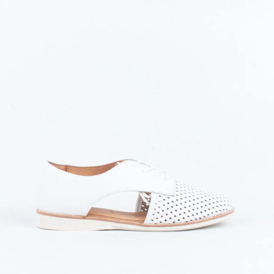 sidecut_punch_31.webp Lace Up^Rollie Sidecut Punch