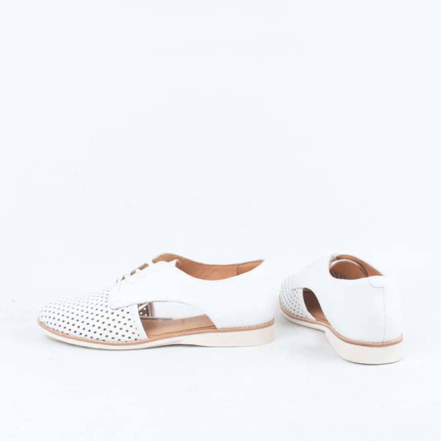 sidecut_punch_33.webp Lace Up^Rollie Sidecut Punch