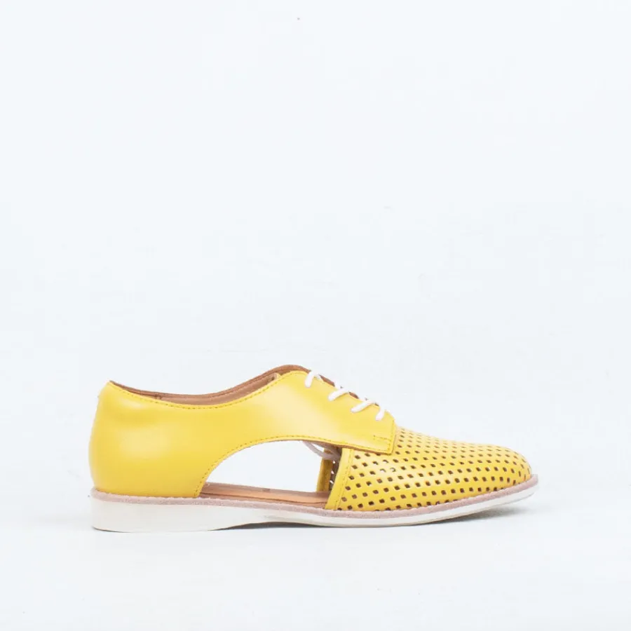 sidecut_punch_34.webp Lace Up^Rollie Sidecut Punch
