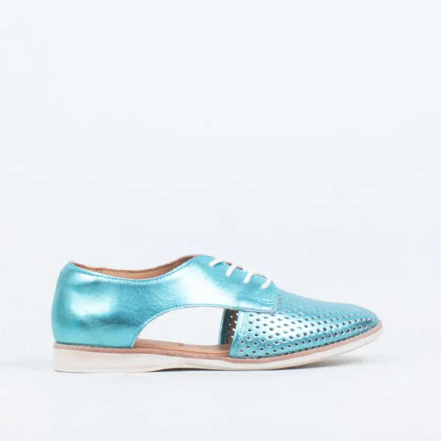 sidecut_punch_5.webp Lace Up^Rollie Sidecut Punch