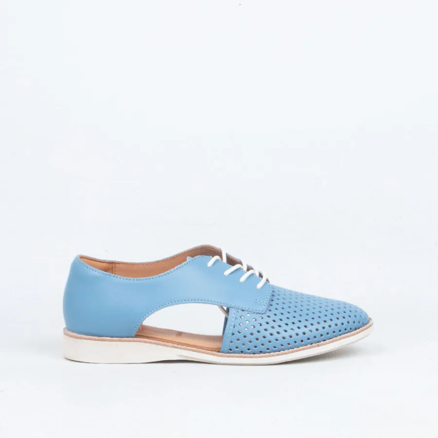 sidecut_punch_8.webp Lace Up^Rollie Sidecut Punch